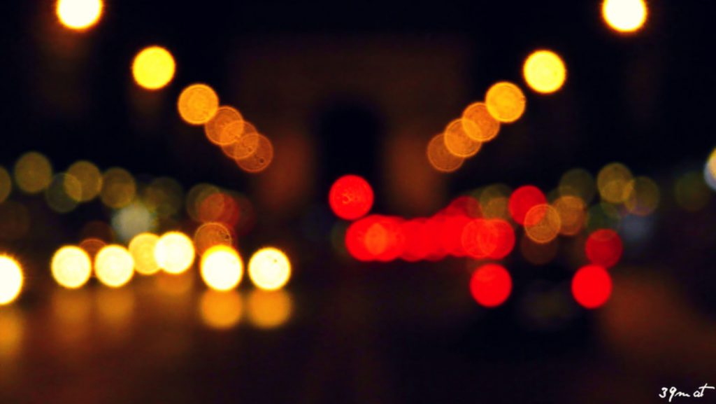 Bokeh in a street at night is an abstract representation of elemental energy between body and mind